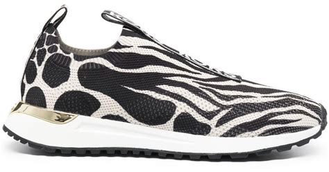 michael kors animal print sneakers.